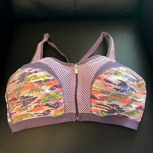 VSX 38DD sports bra clip on for the cups then it zips